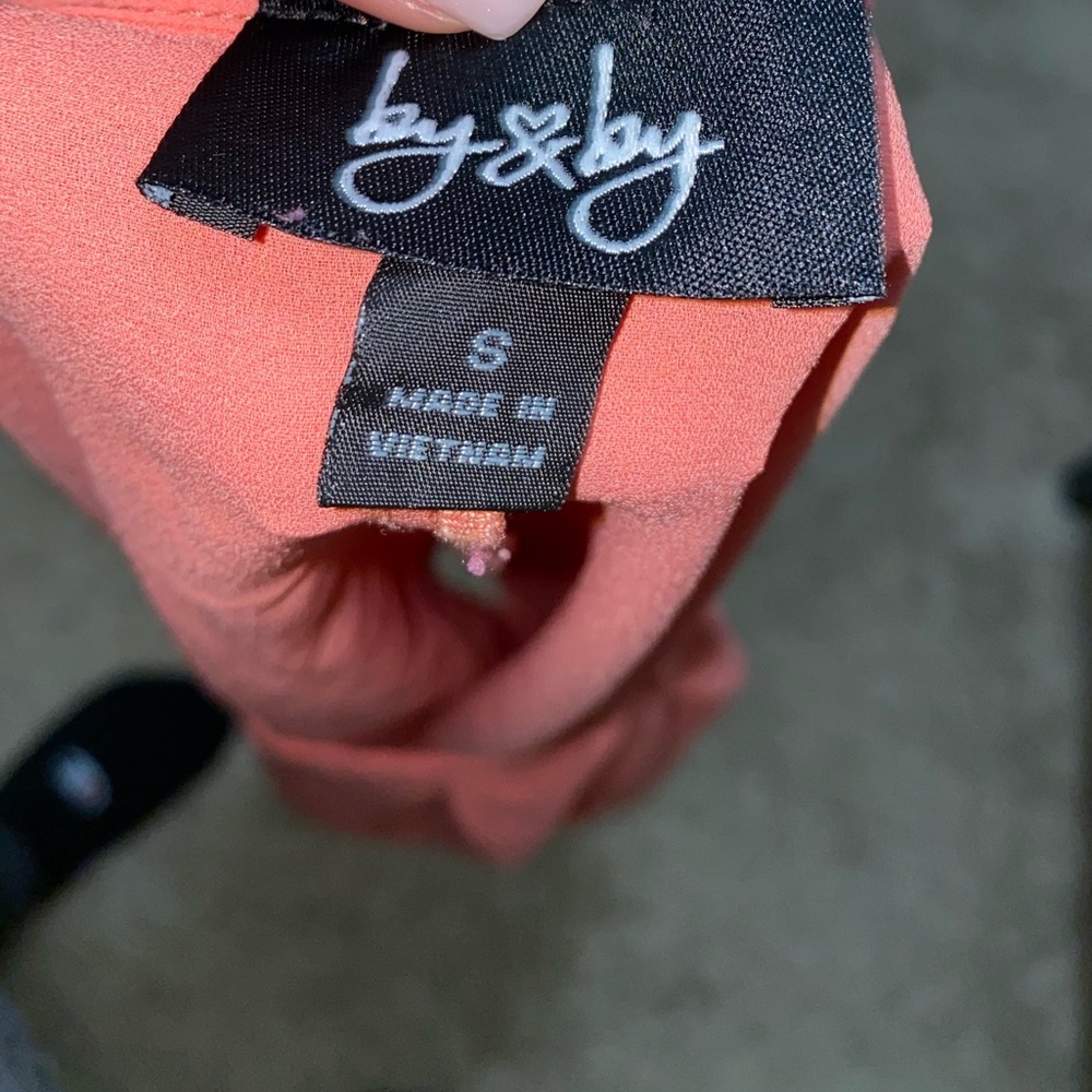 Salmon colored short sleeve blouse